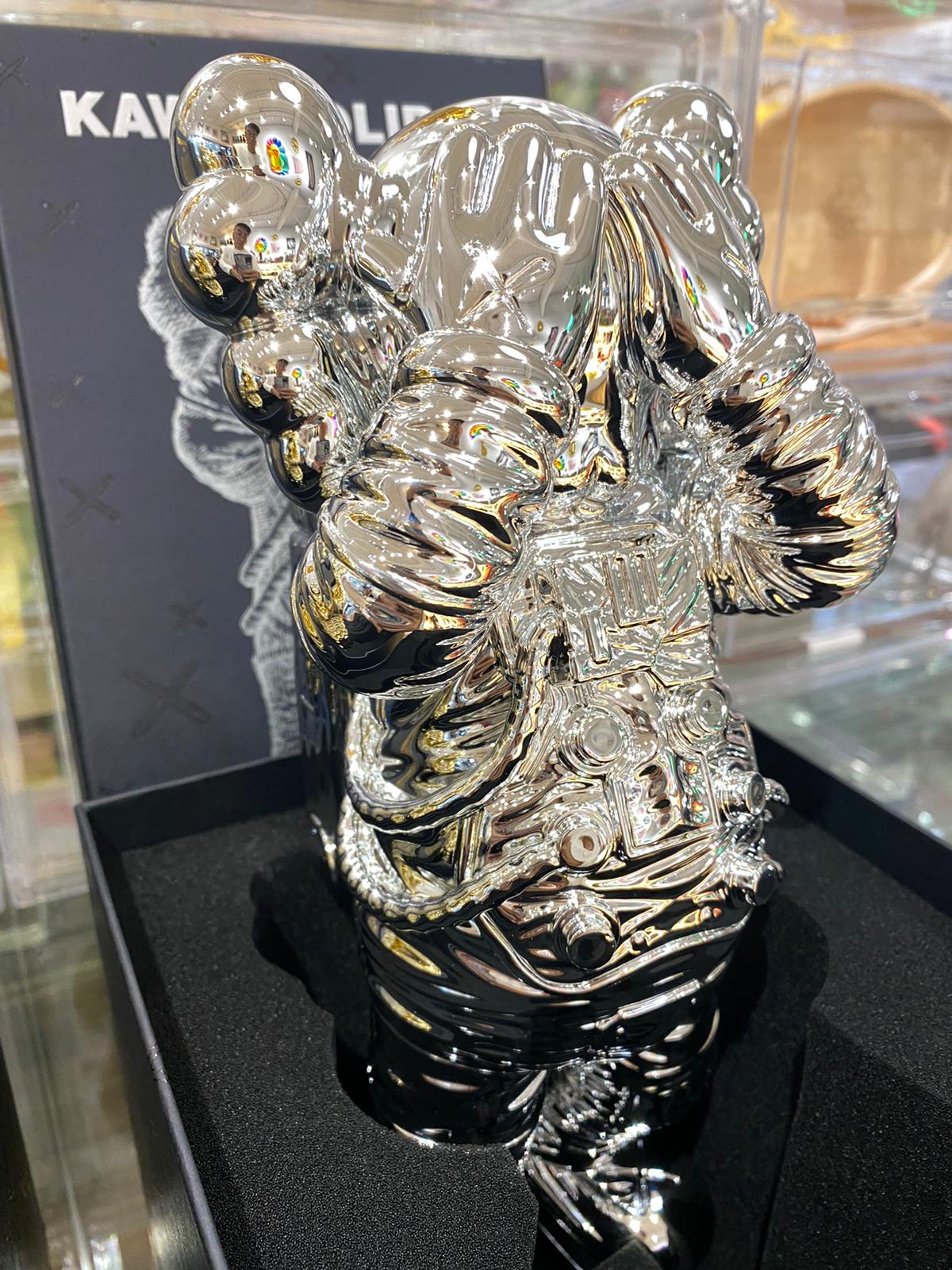 KAWS Holiday Space Figure Gold/Black/Silver Set
