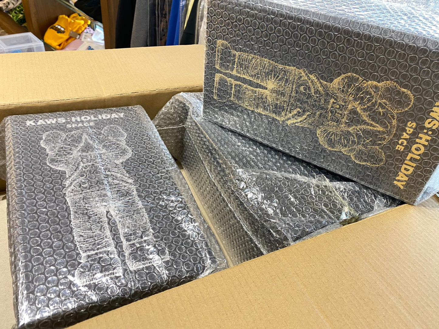 KAWS Holiday Space Figure Gold/Black/Silver Set