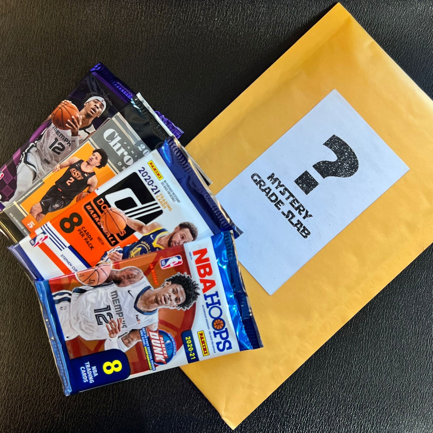 Mystery graded card x 1 + 4 packs of sealed NBA card pack ( Apr12 ) , 98.00