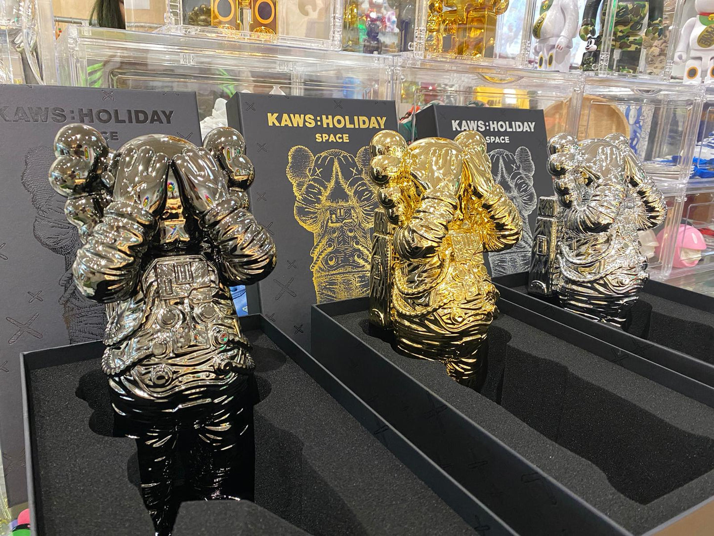 KAWS Holiday Space Figure Gold/Black/Silver Set