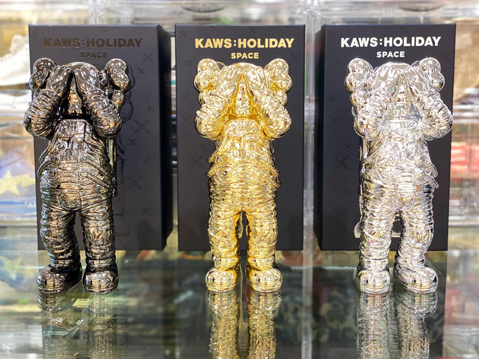 KAWS Holiday Space Figure Gold/Black/Silver Set